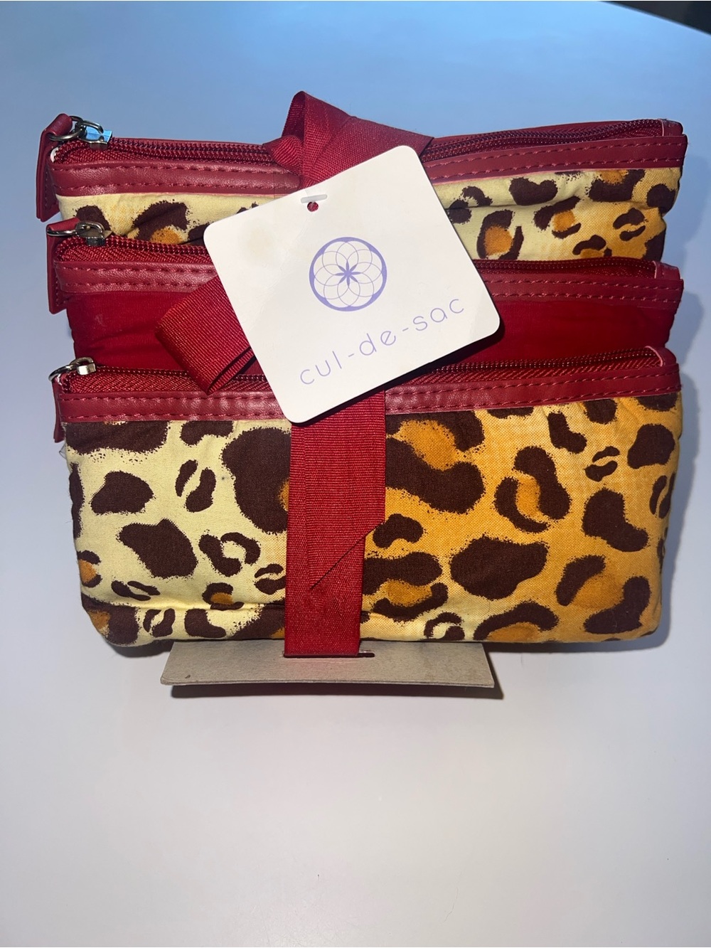 Three Piece Leopard and Red Travel Pouch Set
